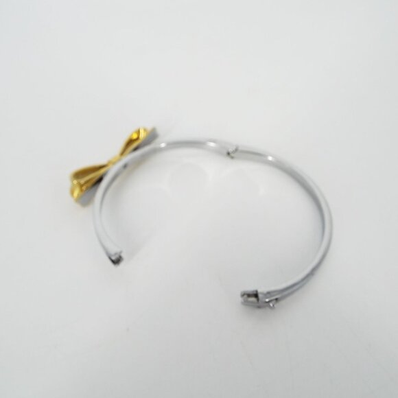 Kate Spade Silver and Gold Tone Bow Bangle Bracelet - Picture 6 of 7
